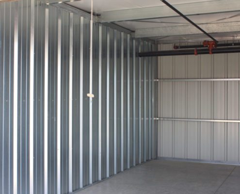 Outside, unheated storage unit, large sizes and tall ceilings for your business and home storage in Calgary.